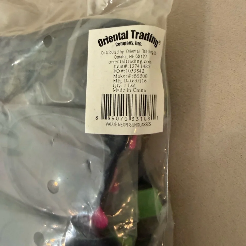 Twelve Plastic Sunglasses